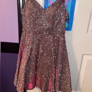 Glitter dress that shifts between shades of pink/purple. Size 3 & true to size.